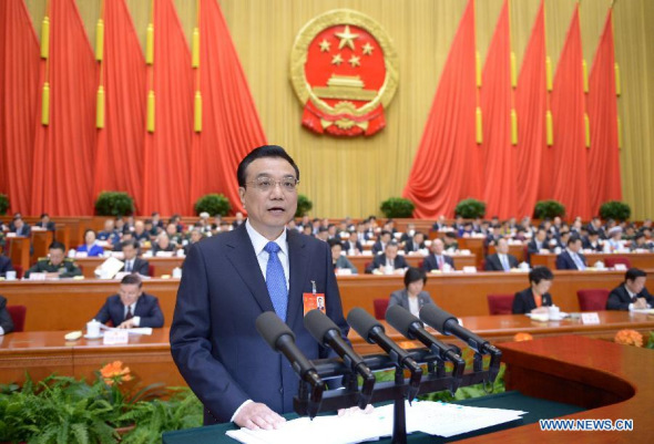 Chinese Premier Li Keqiang delivers the government work report during the opening meeting of the second session of the 12th National People's Congress (NPC) at the Great Hall of the People in Beijing, capital of China, March 5, 2014. (Xinhua/Yao Dawei)