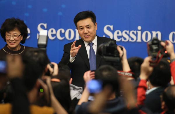 Vice-minister of environmental protection Wu Xiaoqing fields questions by reporters. Wang Jing / China Daily