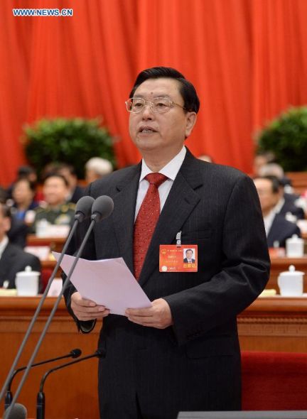 Zhang Dejiang, chairman of the Standing Committee of China's National People's Congress (NPC), presides over the closing meeting of the second annual session of China's 12th NPC in Beijing, March 13, 2014. (Xinhua/Li Xueren)