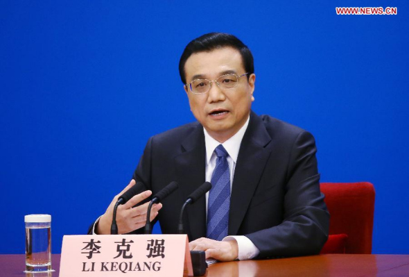 Chinese Premier Li Keqiang speaks at a press conference after the closing meeting of the second annual session of China's 12th National People's Congress (NPC) at the Great Hall of the People in Beijing, capital of China, March 13, 2014. (Xinhua/Chen Jianli)