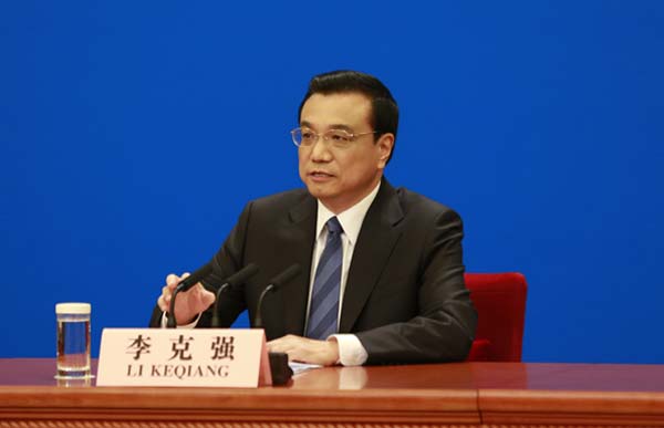 Press conference is held after the closing meeting of the second annual session of China's 12th National People's Congress (NPC) at the Great Hall of the People in Beijing, March 13, 2014. [Photo by Feng Yongbin/chinadaily.com.cn]