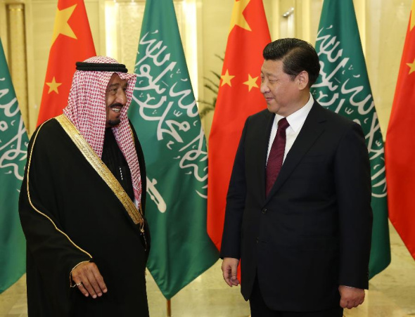Chinese President Xi Jinping (R) meets with Saudi Arabia Crown Prince Salman Bin Abdulaziz Al Saud, who is also the deputy premier and minister of defense, in Beijing, capital of China, March 13, 2014. (Xinhua/Pang Xinglei)