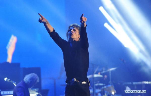 Mick Jagger of The Rolling Stones performs during their concert at Mercedez-Benz Arena in Shanghai, China, March 12, 2014. (Xinhua/Xiao Xiao)