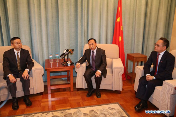 Chen Wenrong (L), military attache of the Chinese embassy who led the special emergency unit, Consul-General Huang Qinguo (C) of the Chinese Consulate in Perth, and unit member Qu Boxun brief the media in the western Australian city of Perth, March 21, 2014. The Chinese embassy in Australia on Friday sent a special emergency unit to the western city of Perth, which will work with the Chinese consulate-general to cooperate with the Australian side to search the missing Malaysian flight MH370. (Xinhua/Xu Yanyan)