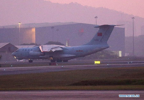 Chinese Air Force IL-76 transport plane takes off from the Royal Malaysia Airforce Base in Subang, Malaysia, March 22, 2014. Three Chinese Air Force planes arrived Malaysia on Friday to help with the search for the missing Malaysia Airlines flight MH370. Two IL-76 transport planes among them were sent to Australia for search on Saturday. (Xinhua/Wang Shen)