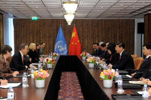 Chinese President Xi Jinping (2nd R) meets with UN Secretary-General Ban Ki-moon (2nd L) in Noordwijk, the Netherlands, March 23, 2014. (Xinhua/Rao Aimin)