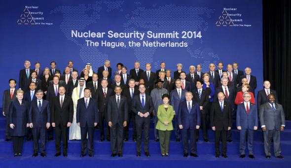 Chinese President Xi Jinping (4th L, front) poses for a group photo during the third Nuclear Security Summit in The Hague, the Netherlands, March 25, 2014. (Xinhua/Zhang Duo)
