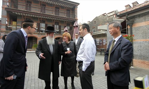 Members of a Jewish delegation tour the Shanghai Jewish Refugees Museum Wednesday during their visit to thank Shanghai and its people for sheltering Jewish refugees during World War II. Photo: Cai Xianmin/GT