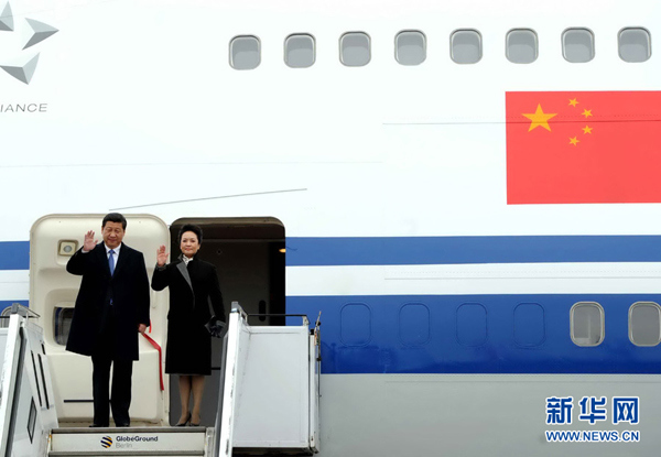 Chinese President Xi Jinping and his wife Peng Liyuan arrive in Berlin for a state visit to Germany on March 28, 2014. (Photo/Xinhua)