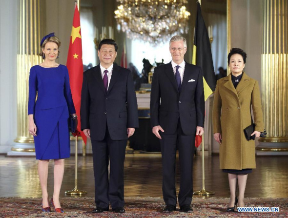 Chinese President Xi Jinping (2nd L), his wife Peng Liyuan (R), King Philippe of Belgium (2nd R) and Queen Mathilde of Belgium pose for a group photo in Brussels, Belgium, March 30, 2014. Xi met with King Philippe of Belgium in Brussels on Sunday. (Xinhua/Lan Hongguang) 