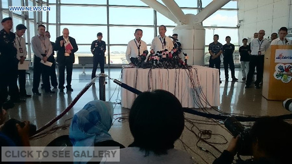 The news conference on the missing Malaysia Airlines Flight MH370 is held in Kuala Lumpur, Malaysia, March 25, 2014. (Xinhua/Wang Shen)