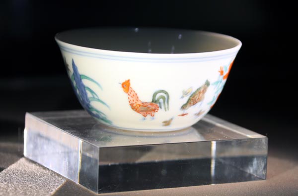 A porcelain cup known as a chicken cup because of its decorations fetched $36 million at a Sotherby's auction in Hong Kong on Tuesday. The buyer was Shanghai billionaire Liu Yiqian. LI PENG / XINHUA