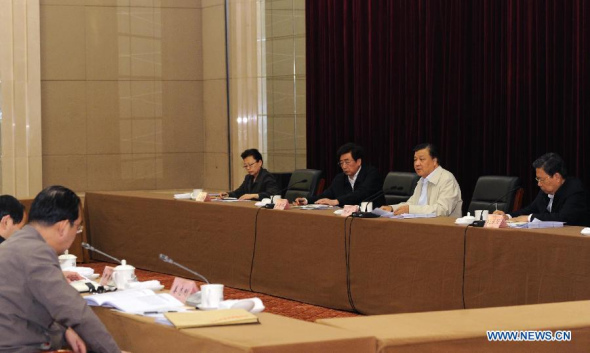 Senior CPC leader Liu Yunshan (2nd R) attends a symposium of organization departments officials of provincial and municipal branches of the CPC, in Beijing, capital of China, April 8, 2014. (Xinhua/Rao Aimin) 