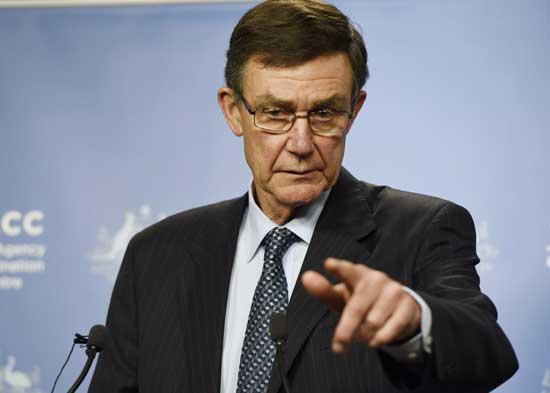 Angus Houston, a retired air chief marshal and head of the Australian agency  coordinating the search for the missing Malaysia Airlines flight MH370, gestures as he addresses the media at Dumas House in Perth April 9, 2014.