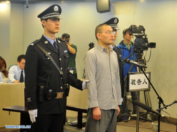Qin Zhihui, known as Qinhuohuo in cyberspace, stood trial at the Chaoyang District People's Court in Beijing, capital of China, April 11, 2014. [File Photo/Xinhua]