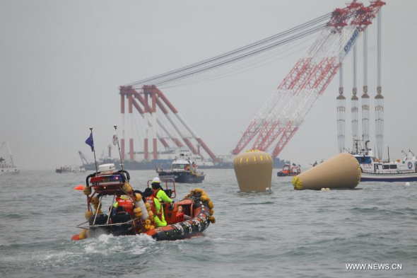 Air bags can be seen near the capsized ferry in Jindo on April 18, 2014.   (Xinhua/Song Cheng Feng)
