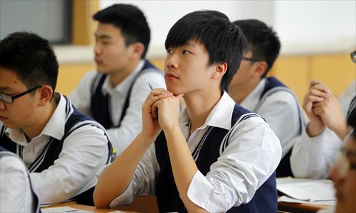 Students at a Shanghai No.8 Senior High School's boys-only class take a Chinese lesson. Photo: Cai Xianmin/GT
