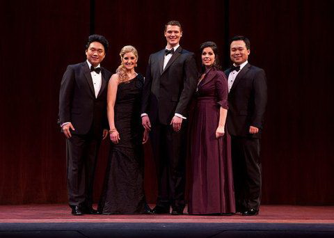 Yi Li (from left) and Ao Li with the other three winners of the 2014 Metropolitan Opera National Council Auditions. Provided to China Daily