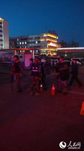 The south railway station of Urumqi, capital of northwest China's Xinjiang region, reopens after a blast occurred at its exit on Wednesday evening, April 30, 2014. [Photo: People's Daily]