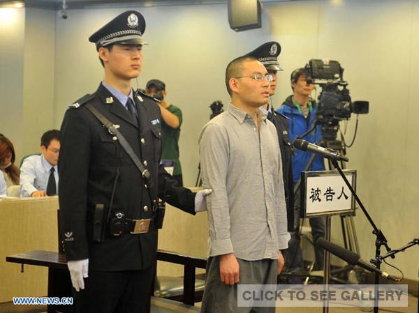 Qin Zhijun, an alleged rumormonger, stood trial at the Chaoyang District People's Court in Beijing, capital of China, April 11, 2014. [Photo/Xinhua]