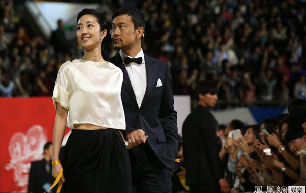 Lead actor and actress Liao Fan and Gwai Lun-Mei from Diao Yinan's Black Coal, Thin Ice at the award ceremony of the 21st Beijing College Student Film Festival. 