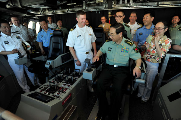Fang Fenghui, chief of the general staff of the People's Liberation Army, tours the bridge of the USS Coronado in San Diego on Tuesday. PHOTO BY US NAVY