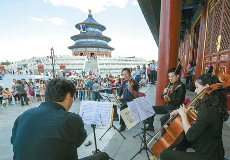 Musicians of the orchestra perform for visitors at the Temple of Heaven in Beijing in 2012.