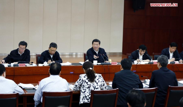 Chinese President Xi Jinping (C, back), also general secretary of the Communist Party of China (CPC) Central Committee, attends a meeting of the standing members of the local Party committee for the mass line educational campaign, in Lankao county, central China's Henan province, May 9, 2014. (Xinhua/Ju Peng)