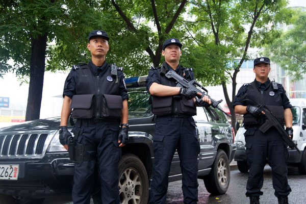 Special police officers patrol the CBD area in Beijing. [Zhang Yujun/For China Daily]