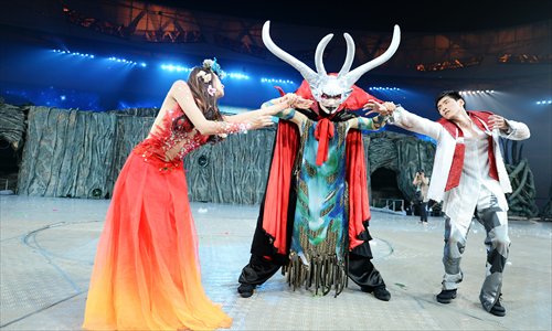 Performers for the live show Attraction perform on stage at the National Stadium in Beijing in 2013. Photo: Courtesy of Beijing Nestyle Culture Corp., Ltd.