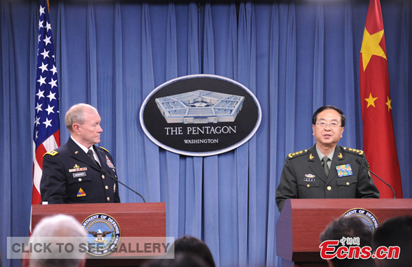 Fang Fenghui, chief of the General Staff of China's People's Liberation Army (PLA), and Martin Dempsey, chairman of the US Joint Chiefs of Staff, hold a joint news conference after their meeting at the Pentagon in Washington, US, May 15, 2014. (Photo: China News Service/Zhang Weiran)