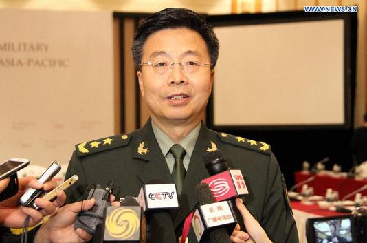 Chinese People's Liberation Army Deputy Chief of General Staff Wang Guanzhong speaks to press at the Shangri-La Dialogue held in Singapore on May 31, 2014. Shangri-La Dialogue, which opened on Friday in Singapore, is a multilateral forum organized by the London-based think tank International Institute for Strategic Studies. (Xinhua/Then Chih Wey)