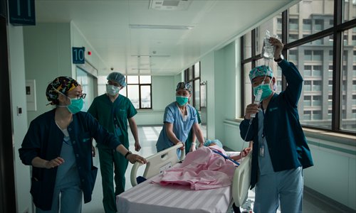 Doctors prep for the institution's first surgery.