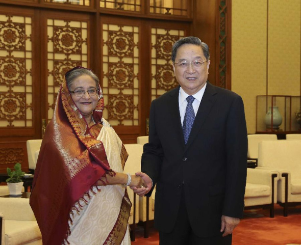 Yu Zhengsheng (R), chairman of the National Committee of Chinese People's Political Consultative Conference (CPPCC), meets with Bangladeshi Prime Minister Sheikh Hasina Wajed in Beijing, capital of China, June 10, 2014. (Xinhua/Ding Lin) 