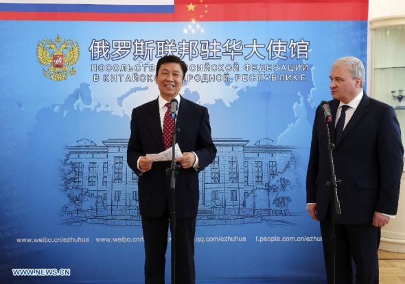 Chinese Vice President Li Yuanchao (L) attends the Russia Day reception at the Embassy of the Russian Federation in Beijing, capital of China, June 11, 2014. (Xinhua/Ding Lin) 
