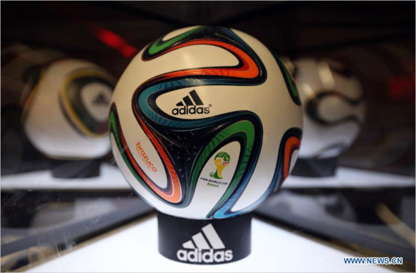 The official ball for the Brazil's World Cup 2014, called Brazuca is shown in Quito, capital of Ecuador, on Jan. 26, 2014. [Photo: Xinhua]