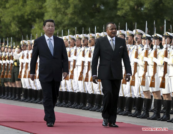 Chinese President Xi Jinping (L) holds a welcoming ceremony for Denis Sassou Nguesso, president of the Republic of Congo, before their talks in Beijing, capital of China, June 12, 2014. (Xinhua/Pang Xinglei)