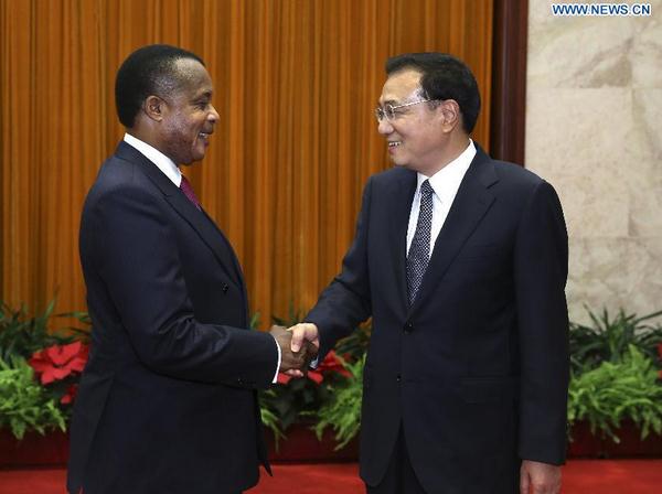 Chinese Premier Li Keqiang (R) meets with Denis Sassou Nguesso, president of the Republic of Congo, in Beijing, capital of China, June 13, 2014. (Xinhua/Pang Xinglei)