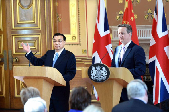Chinese Premier Li Keqiang (L) and British Prime Minister David Cameron hold a joint press conference after their annual meeting in London, Britain, June 17, 2014. [Xinhua/Li Tao]