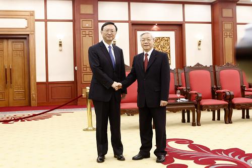 State Councilor Yang Jiechi (left) meets Vietnamese Communist Party General Secretary Nguyen Phu Trong in Hanoi on Wednesday, June 18, 2014. [Photo/Xinhua]