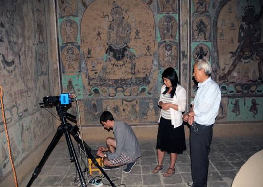 Digital technology is used in the Mogao Grottoes in northwest China to protect the world cultural heritage site from the negative impacts of tourism. [photo / lanzhou.com]