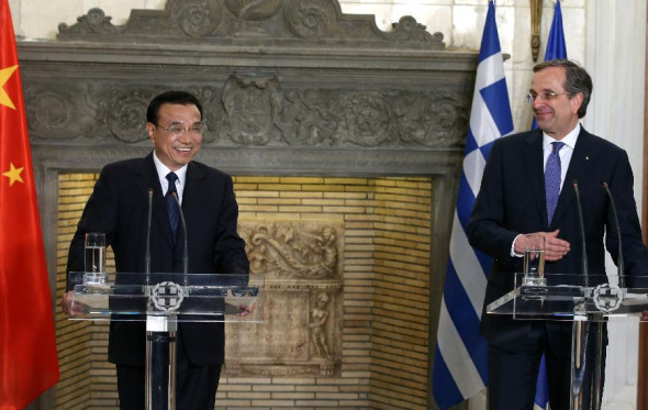 Chinese Premier Li Keqiang (L) and Greek Prime Minister Antonis Samaras hold a joint press conference after their talks in Athens, Greece, June 19, 2014. [Xinhua/Pang Xinglei]
