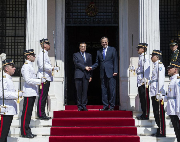 Chinese Premier Li Keqiang (L, center) shakes hands with Greek Prime Minister Antonis Samaras during their talks in Athens, Greece, June 19, 2014. [Xinhua/Wang Ye]