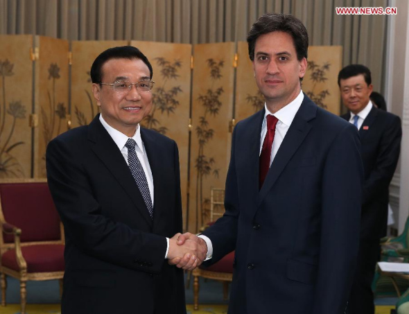 Chinese Premier Li Keqiang (L) shakes hands with Greek Parliament Speaker Evangelos Vasileios Meimarakis during their meeting in Athens, Greece, June 19, 2014. [Xinhua/Wang Ye]