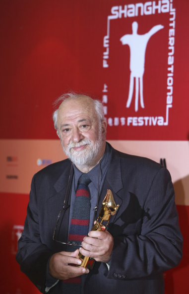 Director Pantelis Voulgaris poses backstage after winning the Best Director award at the 17th Shanghai International Film Festival in Shanghai on Sunday, June 22, 2014. He won the award for the film Little England. [Photo: CRIENGLISH.com/Handout]