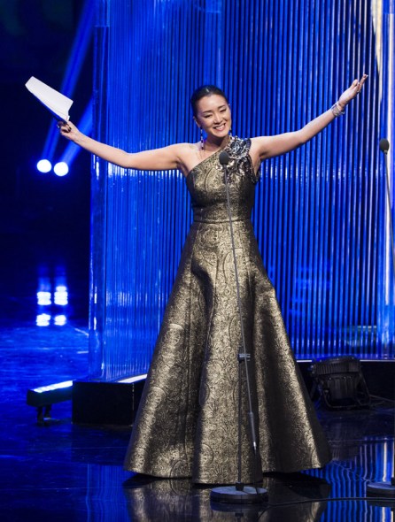 Actress Gong Li, the jury president of the 17th Shanghai International Film Festival, announces the winners during the closing ceremony held on Sunday, June 22, 2014. [Photo: CRIENGLISH.com/Handout]