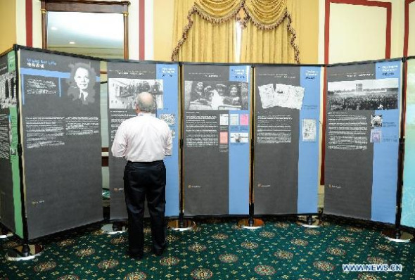 Steven Adleberg, Member of Jewish Community Relations Council, visits the Story of Jewish Refugees in Shanghai Exhibition at Capitol Hill in Washington D.C., capital of the United States, Jun 23, 2014. [Xinhua/Bao Dandan]