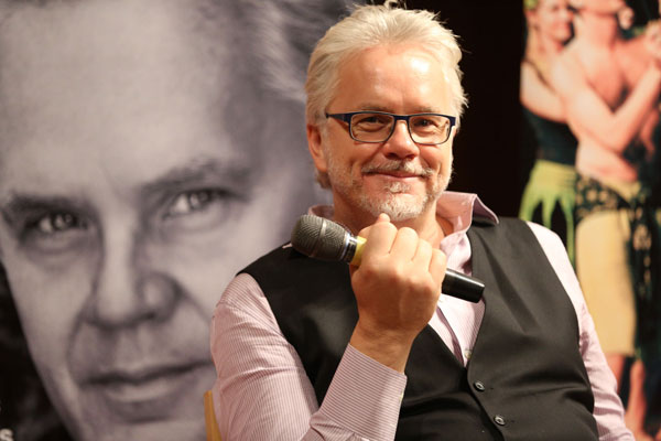 It's a different production of A Midsummer Night's Dream. The costumes are casual, the stage is almost bare, and even the music is modern.