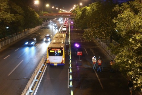 Chang'an Avenue undergoes some maintenance work on Thursday night, June 26, 2014. [Photo/Xinhuanet]