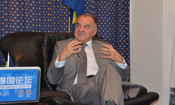 On June 20, 2014, Mr. Borislav Maric, the Ambassador of Bosnia and Herzegovina to China, talks about the World Cup in an interview with Peoples Daily Online. (People's Daily Online/Huang Yuqi)